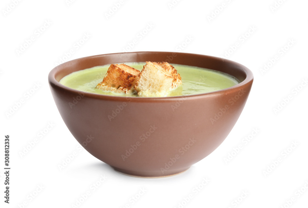 Delicious broccoli cream soup with croutons isolated on white Delicious broccoli cream soup with croutons isolated on white