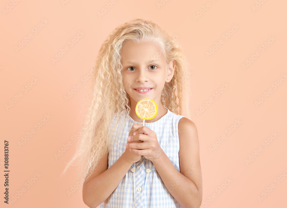Cute little girl with lollipop on color background Cute little girl with lollipop on color background