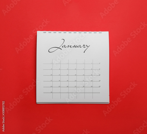 January calendar on red background, top view