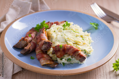 Lamb liver wrapped in bacon with mash potato
