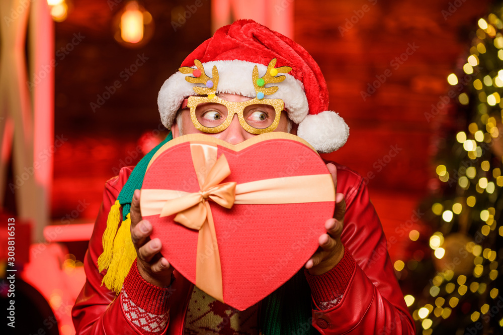 Gift with love. bearded man go shopping. xmas gifts. gifts at Christmas tree. Merry christmas. happy new year. Secret santa. presents from santa. winter holiday shopping. party celebration