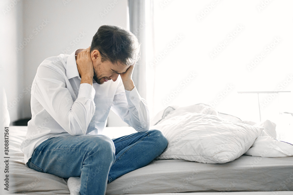 young man sitting on sofa