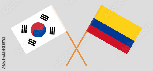 Crossed flags of Colombia and South Korea