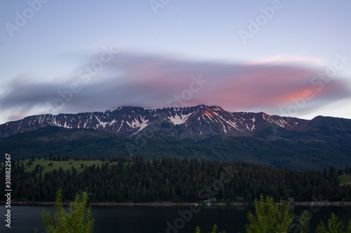 long exposure cloud over mountain range near lake wallowa