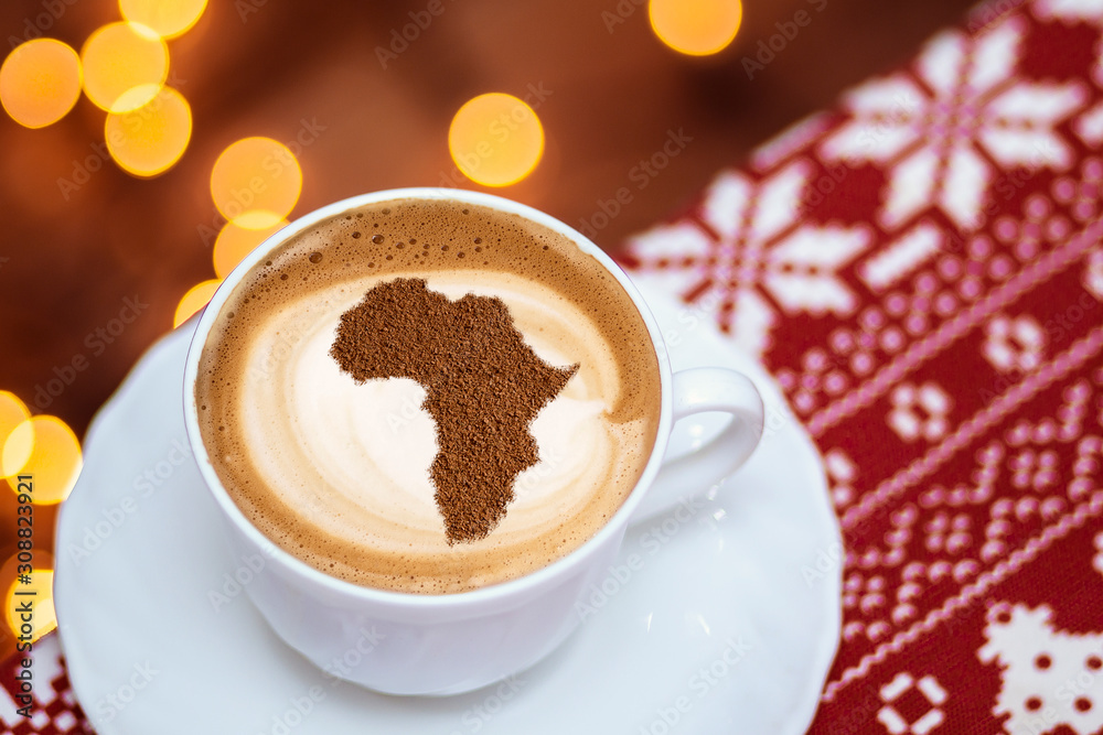 Cup of cappuccino with a picture of Africa