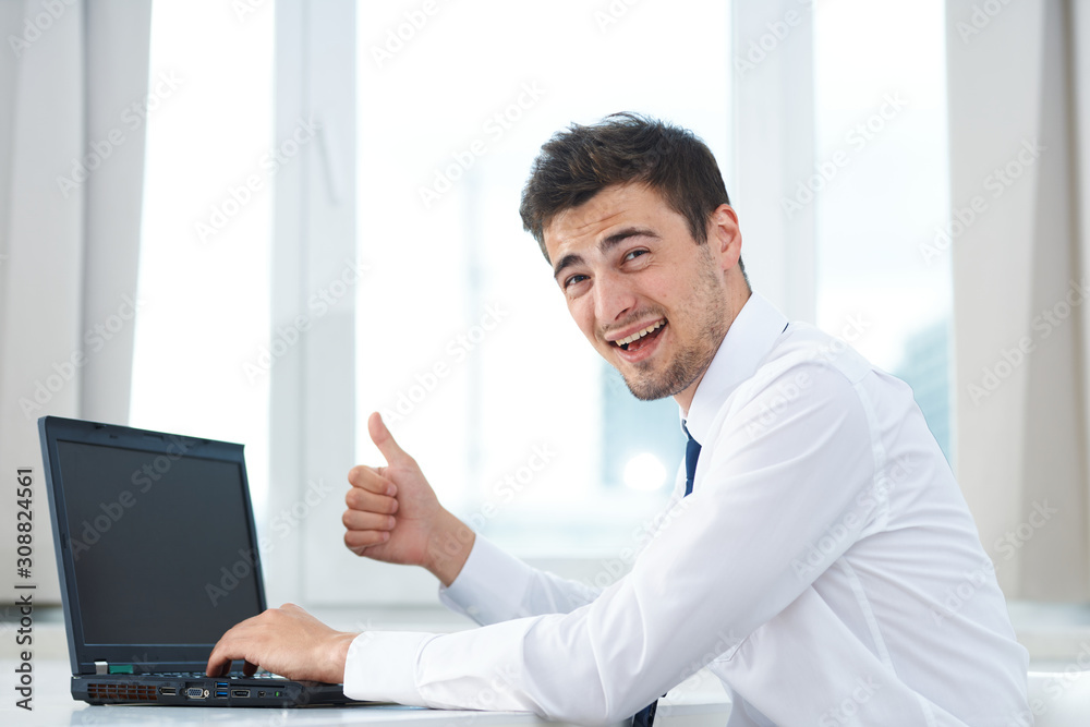 businessman working on laptop in office businessman working on laptop in office
