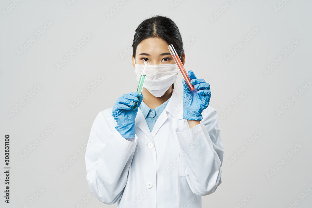 doctor with mask and syringe