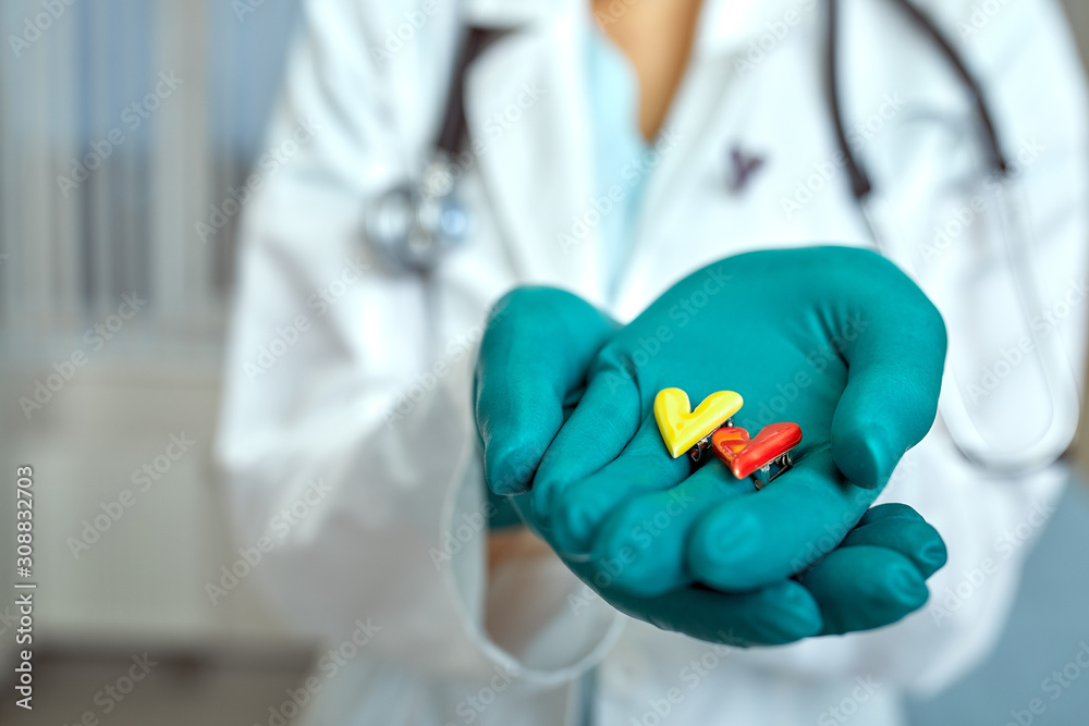 doctor holding simbols of heart in hand with medical care concept, Medicine in hospital, cardiology doctor holding simbols of heart in hand with medical care concept, Medicine in hospital, cardiology