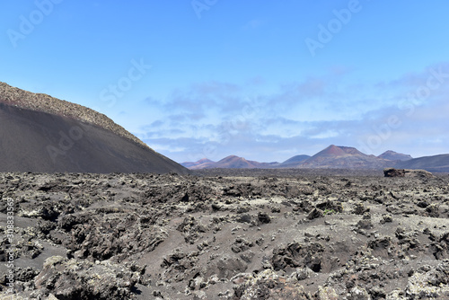 Volcanic landscape and volcano craters at Timanfaya National Park, Lanzarote, Canary Islands, Spain
