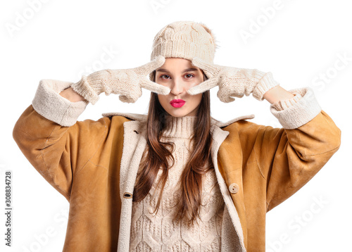 Happy young woman in winter...