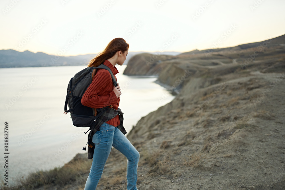 Fototapeta premium woman on top of mountain