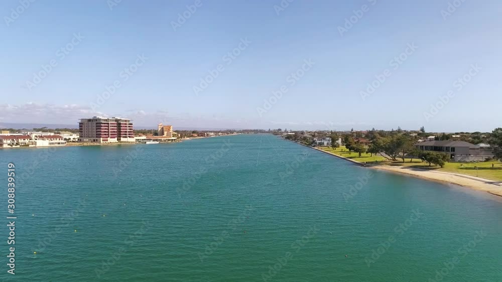 Aerial shot over West Lakes and the shorefront in Tennyson, Adelaide, on a beautiful sunny day. Aerial shot over West Lakes and the shorefront in Tennyson, Adelaide, on a beautiful sunny day.