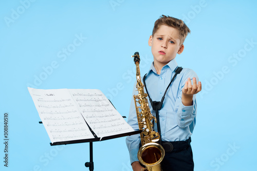 boy with saxophone