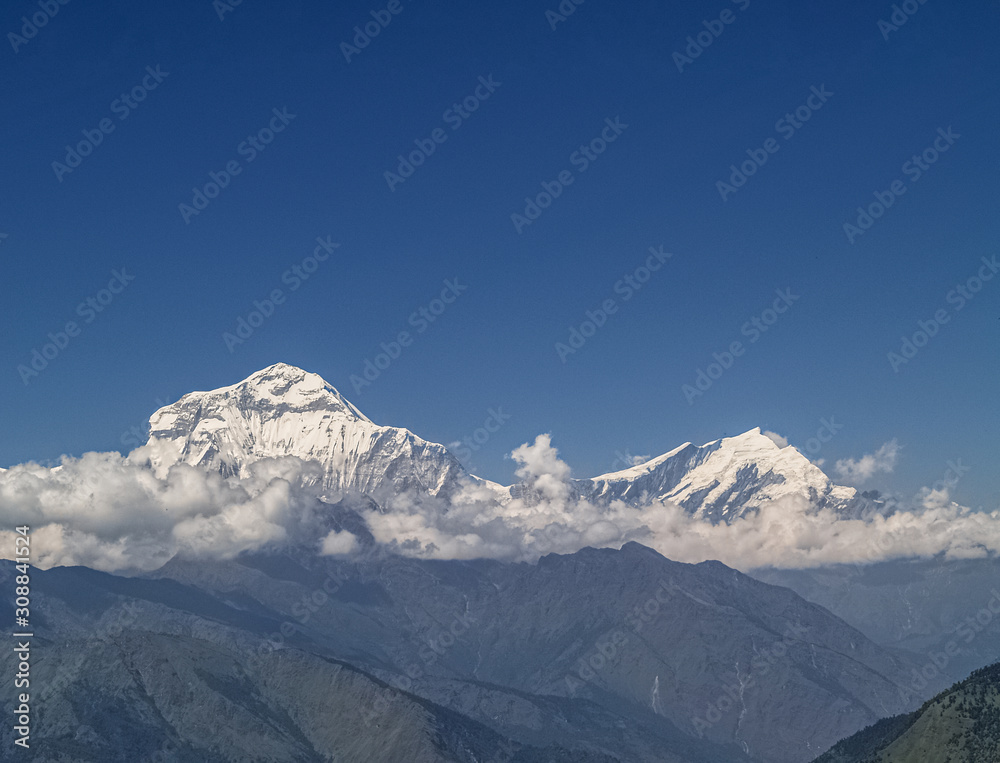 Beautiful Shot of a Snowy Mountain With Clear Blue Sky