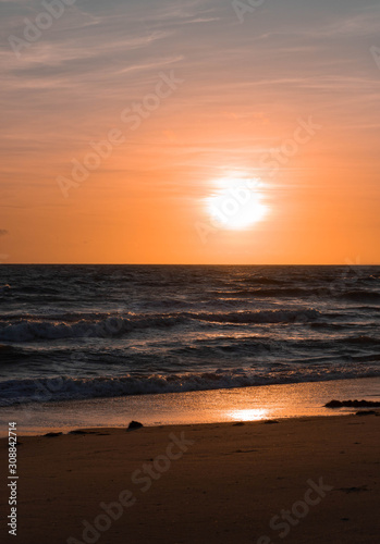 sunset on the beach © Keison