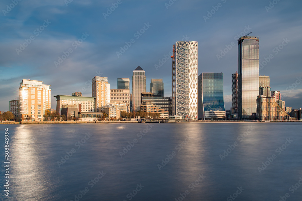 Skyline of Canary Wharf District With the Sun Reflecting in Buildings, London, UK Skyline of Canary Wharf District With the Sun Reflecting in Buildings, London, UK