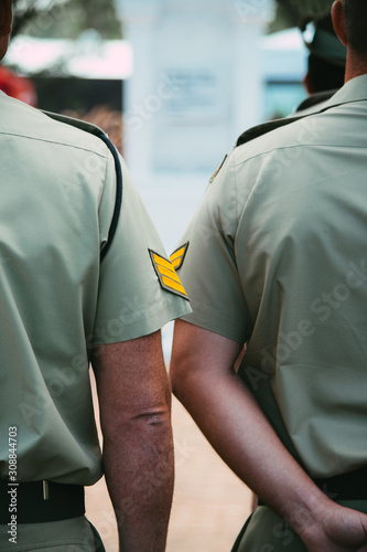 Obraz na plátně Close-up of Australian Army sergeant and soldiers during ANZAC Day remembrance c