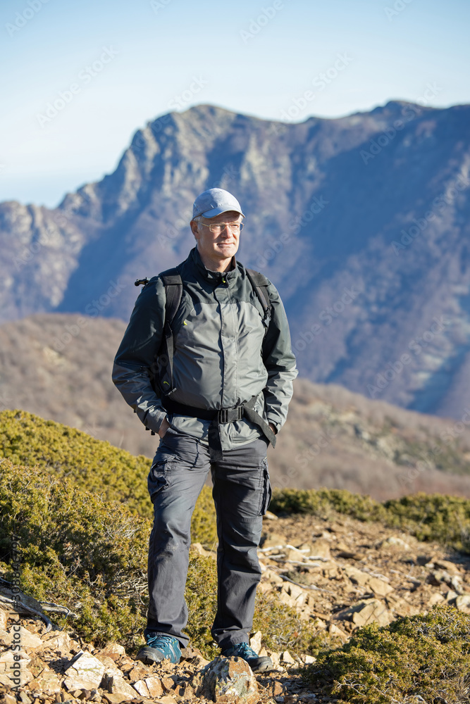 Caucasian tourist man posing in the Spanish mountain Montseny