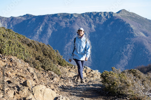Spanish tourist woman walking in the Spanish mountain Montseny