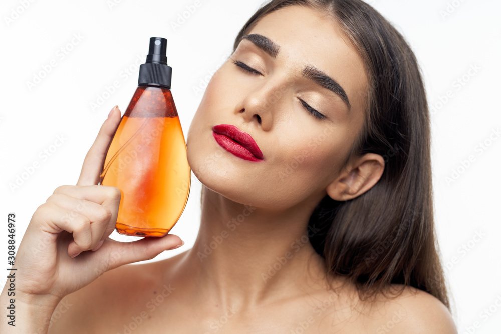 woman with glass of orange juice