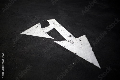 A black tarred road marks a white forward or right pain