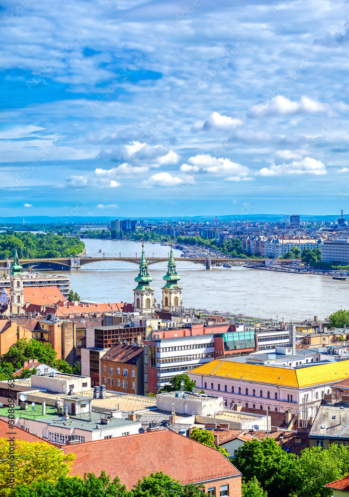Fototapeta premium A view of Budapest, Hungary along the Danube River from Fisherman's Bastion.