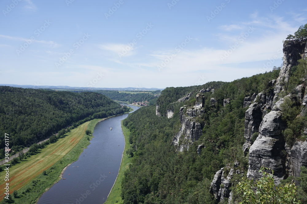 View over the Elbe river and the cliffs of Saxon Switzerland to Stadt Wehlen