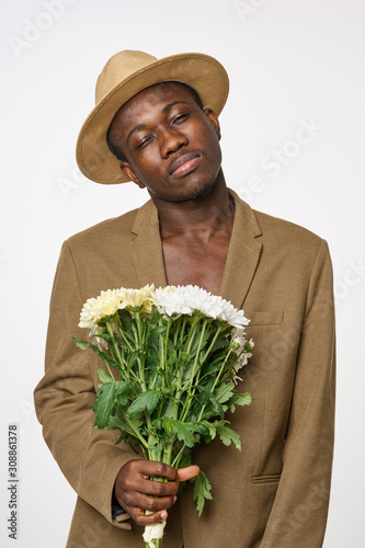 man with bunch of flowers