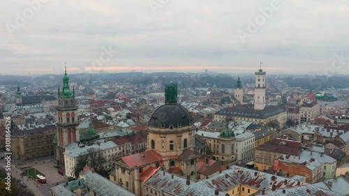 Wallpaper Mural flight above the roofs on sunrise. old european city. Ukraine Lviv City Torontodigital.ca