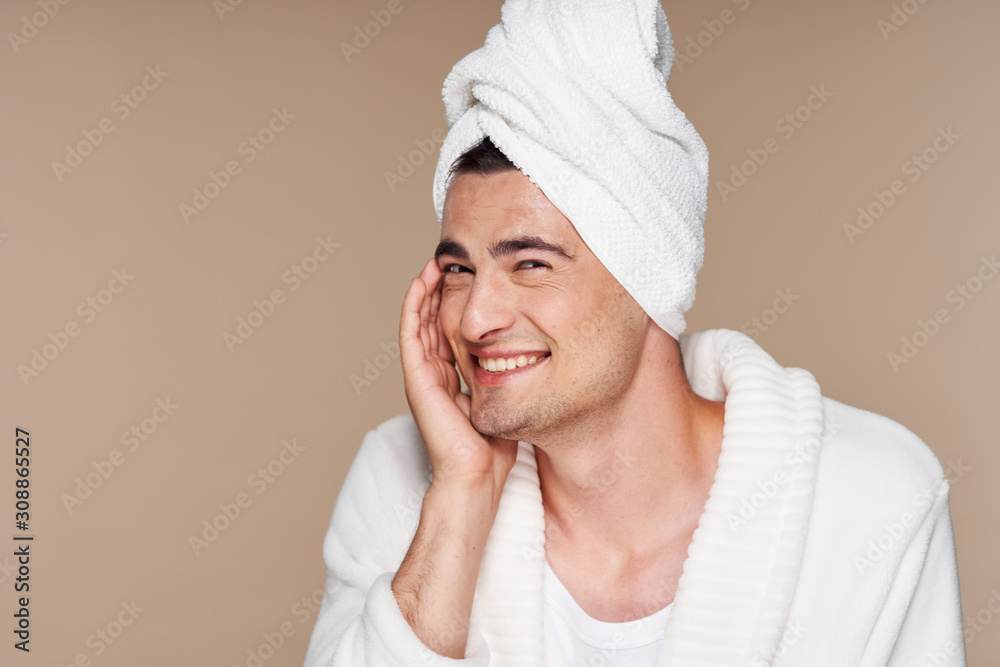 portrait of a man with towel on his head portrait of a man with towel on his head