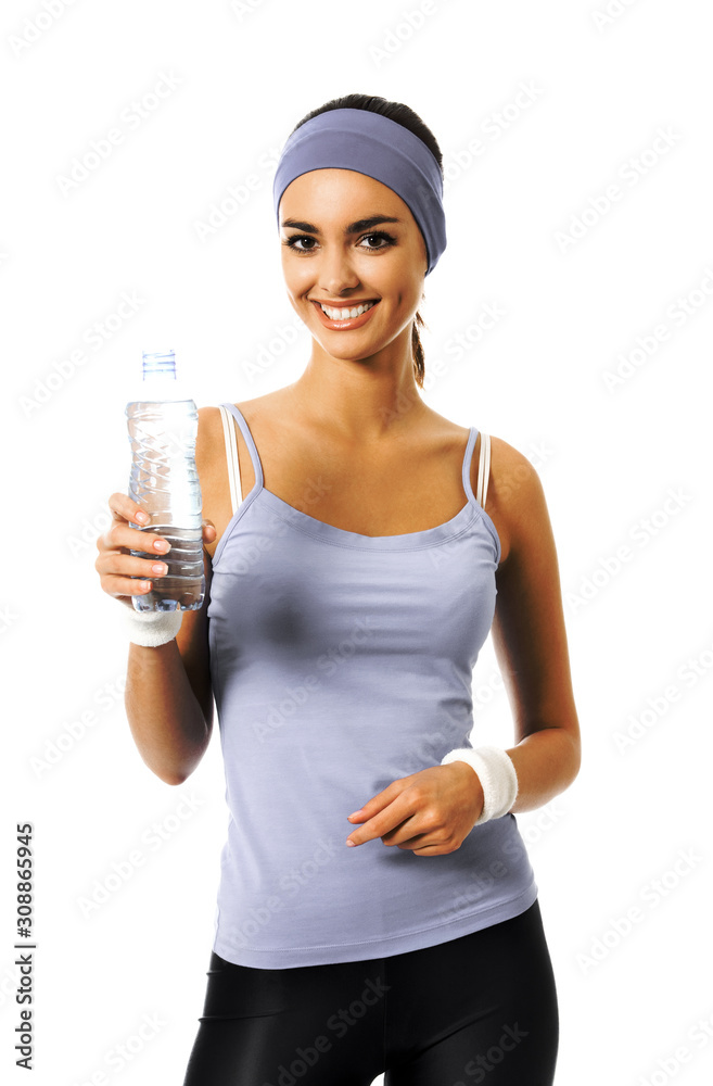 Happy smiling young african american woman in sportswear with bottle of water, isolated against white background. Young sporty model at studio shot. Health, beauty and fitness concept. Happy smiling young african american woman in sportswear with bottle of water, isolated against white background. Young sporty model at studio shot. Health, beauty and fitness concept.