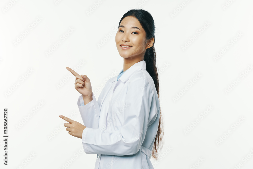 young woman pointing at copyspace young woman pointing at copyspace