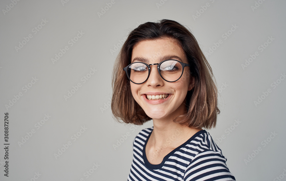 portrait of a young woman in glasses
