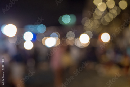 Bokeh light in the evening market city at Bangkok , Thailand.Abstract bokeh light of the city in night time