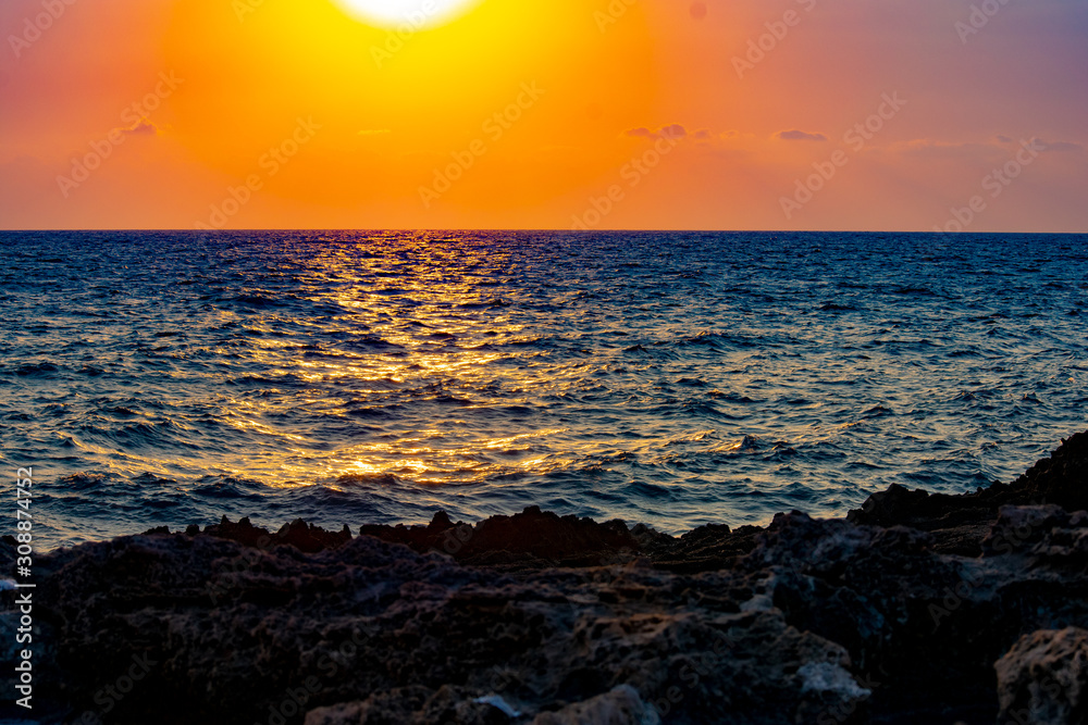 Obraz premium Sunset over the Mediterranean sea