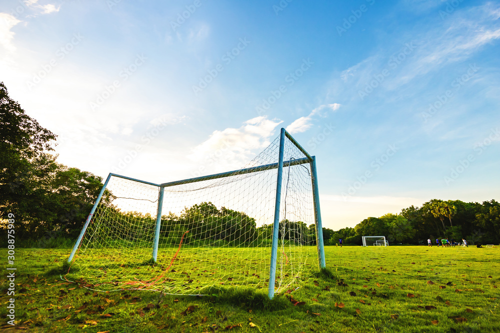 goal football in the park with a sunlight. goal football in the park with a sunlight.