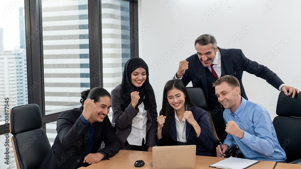 Success team work cheerful in office or workplace . Success team work concept Success team work cheerful in office or workplace . Success team work concept