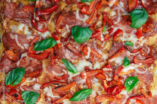 pizza topping with basil, pepper, cheese, ham, seasonings, tomatoes, ketchup 
