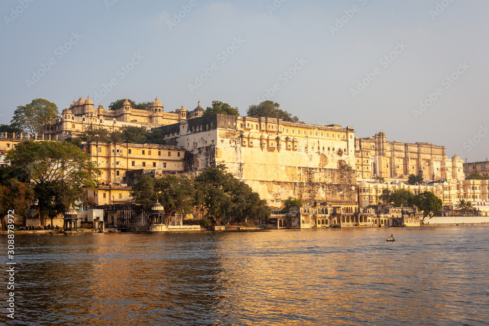 View of the city palace of Udaipur from the Pichola lake, Rajasthan, India