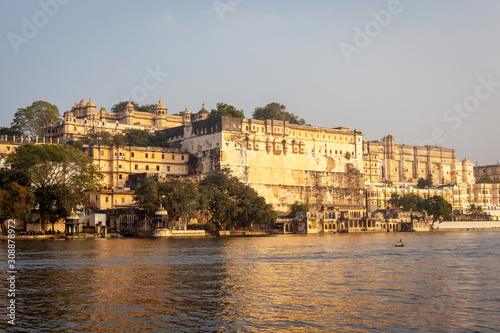 View of the city palace of Udaipur from the Pichola lake, Rajasthan, India