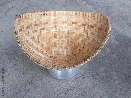 wicker basket on wooden background