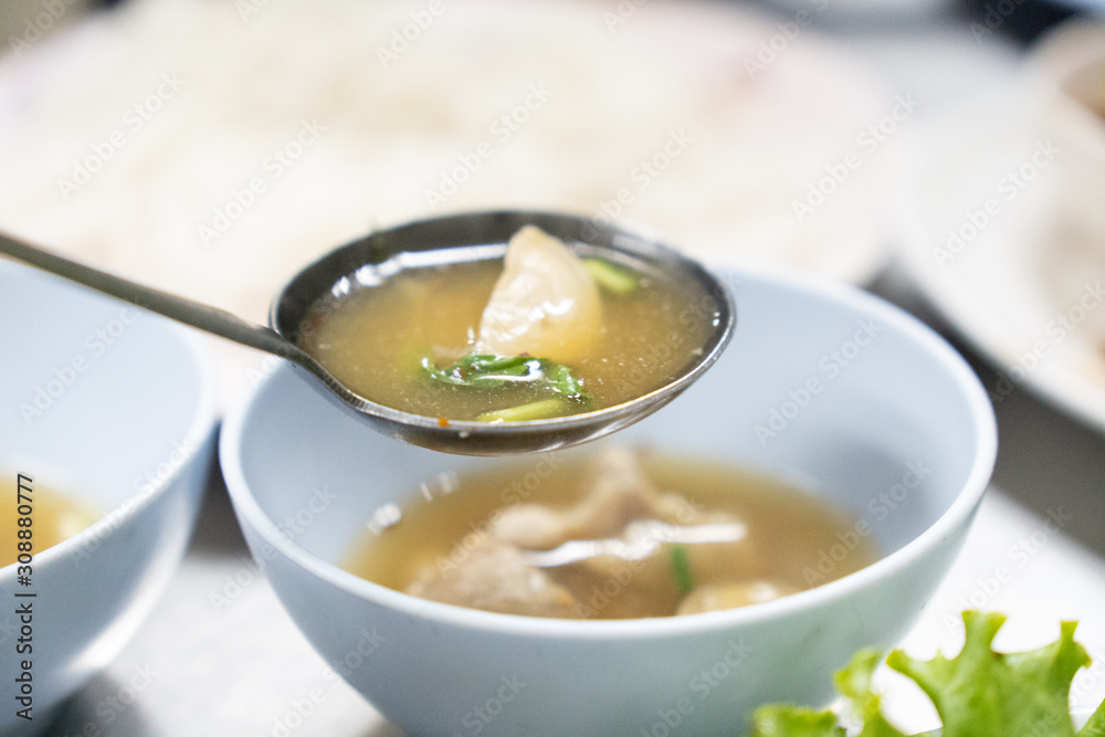 Scoop boiled zoop cartilage with a ladle. Scoop boiled zoop cartilage with a ladle.