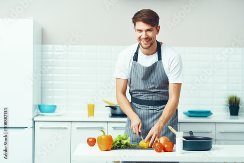 man cooking in kitchen