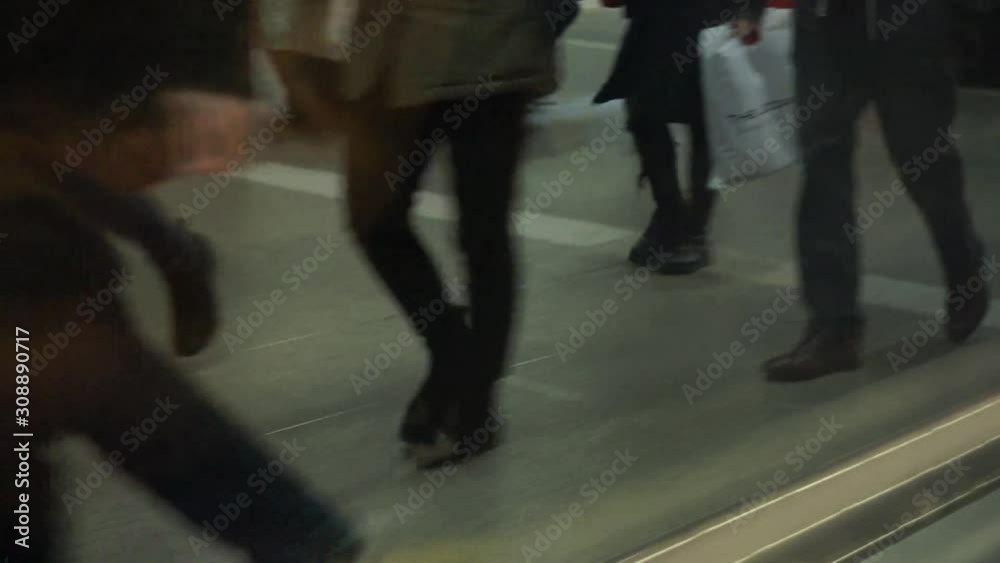 People walking on a busy train station, seen from departing train Slow motion People walking on a busy train station, seen from departing train Slow motion