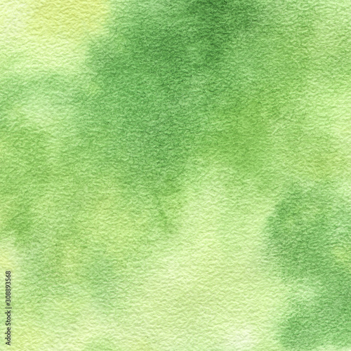 Abstract green watercolor background, bright, contrast splashes, drops, smudges. Artistic background with paper texture.