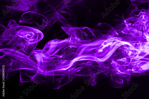 Fotomurale Purple smoke abstract on black background for design
