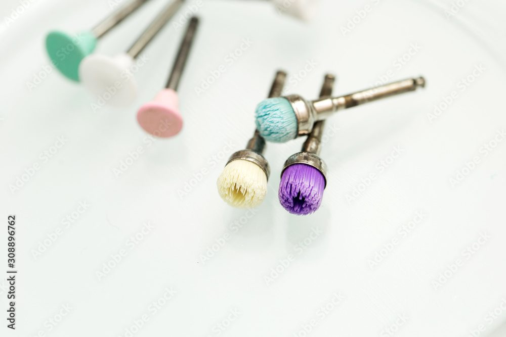 Dental polishing brush on a white isolated background close-up. Dental polishing brush on a white isolated background close-up.