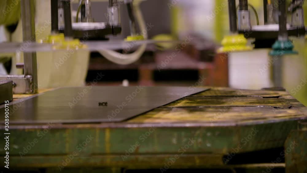 Stamping metal sheets for car parts. Automotive manufacturing industry Stamping metal sheets for car parts. Automotive manufacturing industry