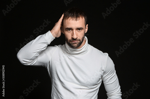 Portrait of young man on da...