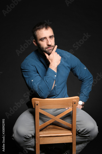 Portrait of young man on da...